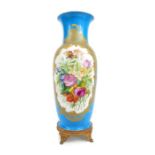 A 19th century hand painted floral vase on a turquoise ground