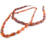 Two polished carnelian bead necklaces