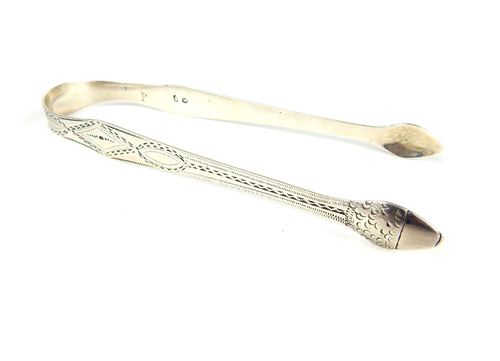 A pair of Georgian hallmarked silver sugar tongs