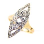 A 9 ct yellow gold and platinum diamond set, marquise shaped ring.