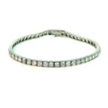 A white gold diamond-set tennis link bracelet