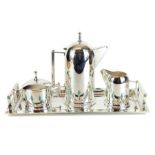 A Danish modern movement silver plated tea set with tray, the sever lines enriched with green