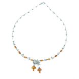 A 14 ct white gold, diamond and citrine necklace