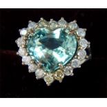 An 18 ct white gold heart shaped aquamarine dress ring.