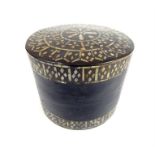 An early 20th century lacquered Thai betel box, inset with mother of pearl decoration, 11cm high