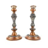 A Victorian pair silver plate on copper candlesticks, cast with acanthus leaf decoration, raised