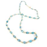 A fine 14 ct yellow gold contemporary blue topaz necklace, Length 26 cm