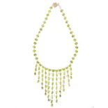 A contemporary multi- line faceted peridot necklace set in silver bezel settings, Length 32 cm,