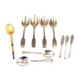 An assortment of antique silver flatware