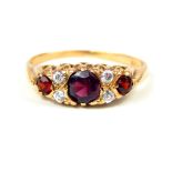 A Victorian 9 ct yellow gold garnet and Cubic Zirconia ring