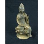 A bronzed metal Buddha figurine; 18.5 cm high.