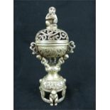 A 20th century oriental white metal lidded incense burner