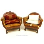 A pair of distressed brown leather armchairs, having rounded backs and studded detail