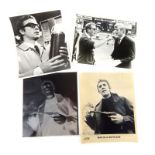 A small collection of 1960's black and white photographs of Michael Caine in Alfie.