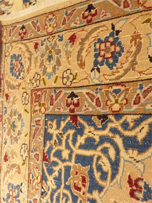 A part silk central Persian Nain rug, having foliate motifs on an ivory field with blue spandrels, - Image 2 of 2