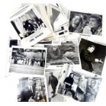 A large collection of black and white photographs, mainly from 1960's films and television programme