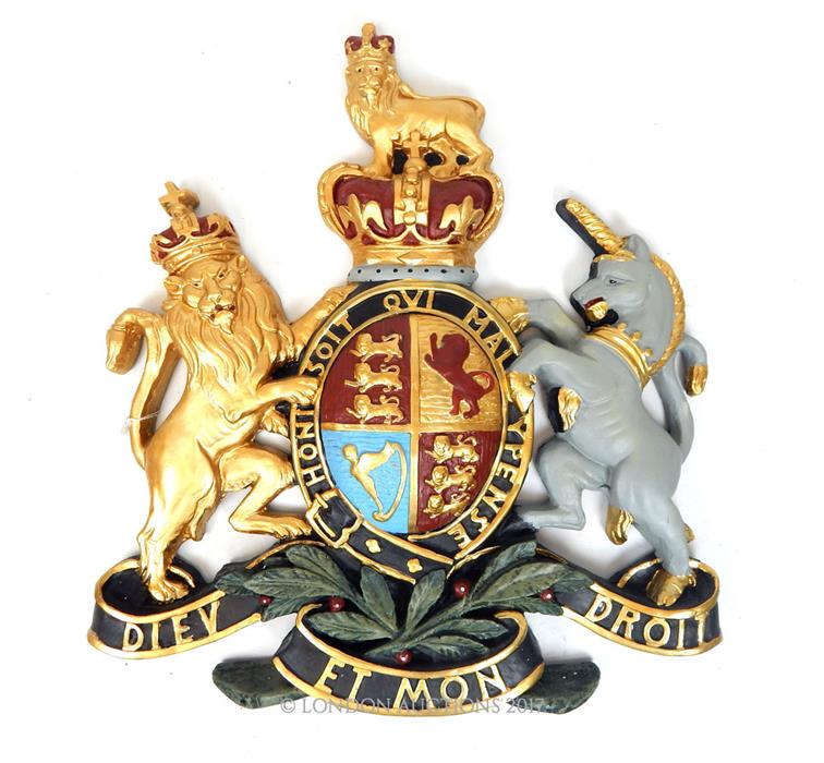 A painted resin model of the royal coat of arms