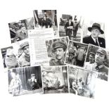 A group of twelve black and white photographs of Peter Sellers, appearing in various stage and