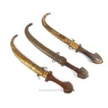 A group of three North African, possibly Moroccan, early 20th century daggers (Kris), each with