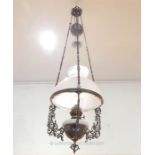 A mid / late Victorian painted spelter rise and fall ceiling oil lamp and shade.