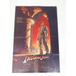 A film poster for "Indiana Jones and the Temple of Doom"; folded; 104 cm x 69 cm.