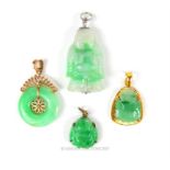 Four carved green jade pendants in yellow and white metal mounts, Lengths: 3 cm, 2 cm, 2.5 cm and