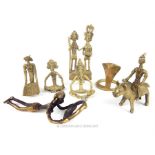 A group of seven North Indian brass Hindu deities in various forms.