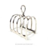 A George V hallmarked silver four division toast rack, Harrison Brothers & Howson, Sheffield 1927,