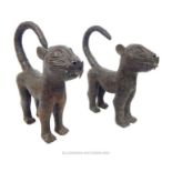 A pair of Nigerian Benin cast bronze standing leopards