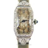 An Art Deco platinum and diamond set ladies cocktail watch