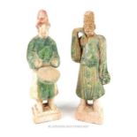 Two Chinese plaster cast figurines of musicians; with some original green computation; 21cm high.