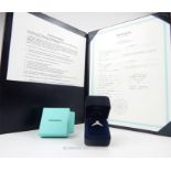 A fine,18 ct white gold, Tiffany & Co diamond solitaire ring with certificate of authenticity