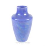 A Ruskin pottery shouldered vase, with a purple lustre glaze, the base with impressed marks