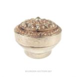 A 19th century Malay / Thai silver betel box and cover, 6cm high