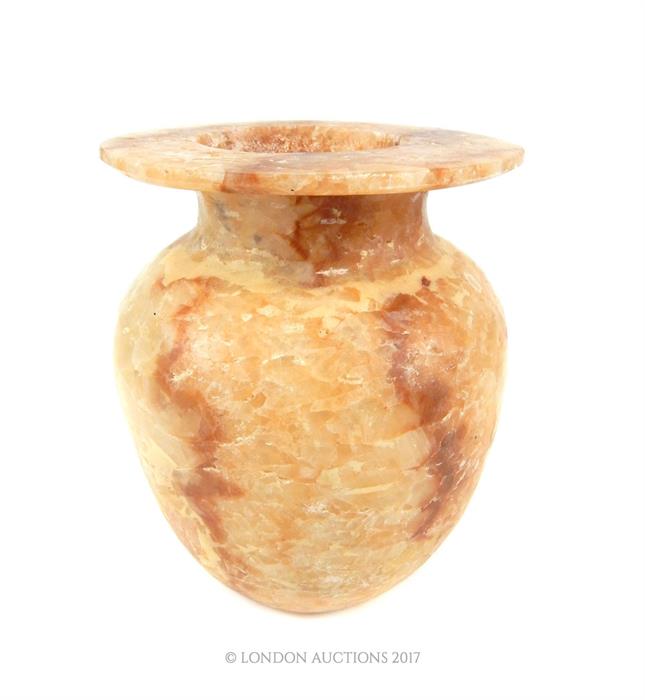 A large alabaster vase