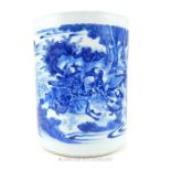 A large possibly transitional Chinese hand painted blue and white porcelain brush holder