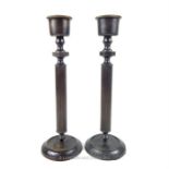A stylish pair of bronzed effect candlesticks