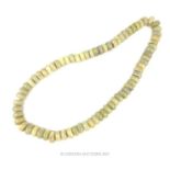 A Jade hoop necklace; 79 cm long