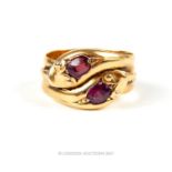 An antique, 18 ct yellow gold and ruby snake ring