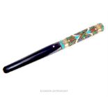 An early 20th century Russian enamel and silver cigarette holder