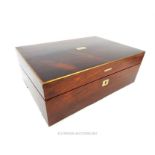 An early 19th century mahogany and rosewood writing box, brass edged, red leather gilt tooled slope,