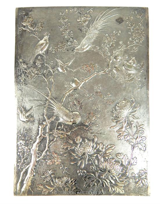 A late 19th / early 20th century Japanese silver rectangular panel, decorated with exotic birds