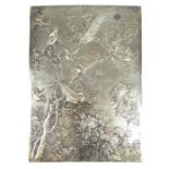 A late 19th / early 20th century Japanese silver rectangular panel, decorated with exotic birds