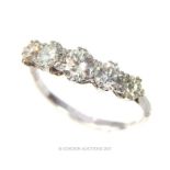 An elegant five stone graduated diamond ring