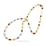 A fine, 14 ct yellow gold, contemporary multi stone necklace