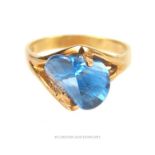 A fine,18 ct yellow gold and aquamarine ring