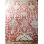 A Persian Ziegler carpet, with palmette design on a muted red field