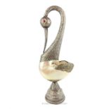 An impressive, eastern white metal and nautilus shell vase in the form of a swan