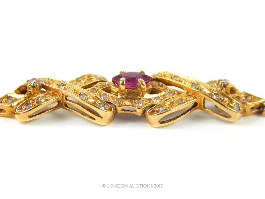 A high carat yellow metal bracelet,set with a marquise cut pink stone and diamond chips, 18 cm long, - Image 2 of 3