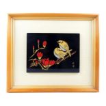 A contemporary framed Japanese lacquered panel, hand painted with a pair of birds sitting upon a